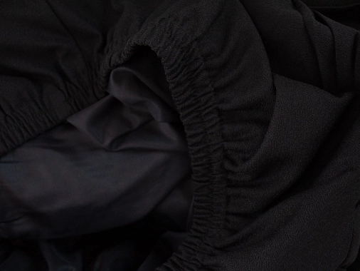XL/XXL Černá dámská plisovaná sukně s podšívkou