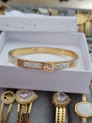 Luxusní dámský pevný náramek zirkony zlatý