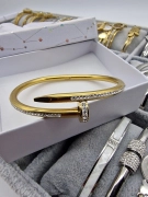 Luxusní dámský náramek Lora hřebík zlatý zirkony